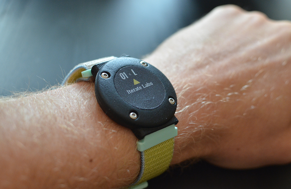 An Iterate Labs wearable worn on a person's wrist like a watch.