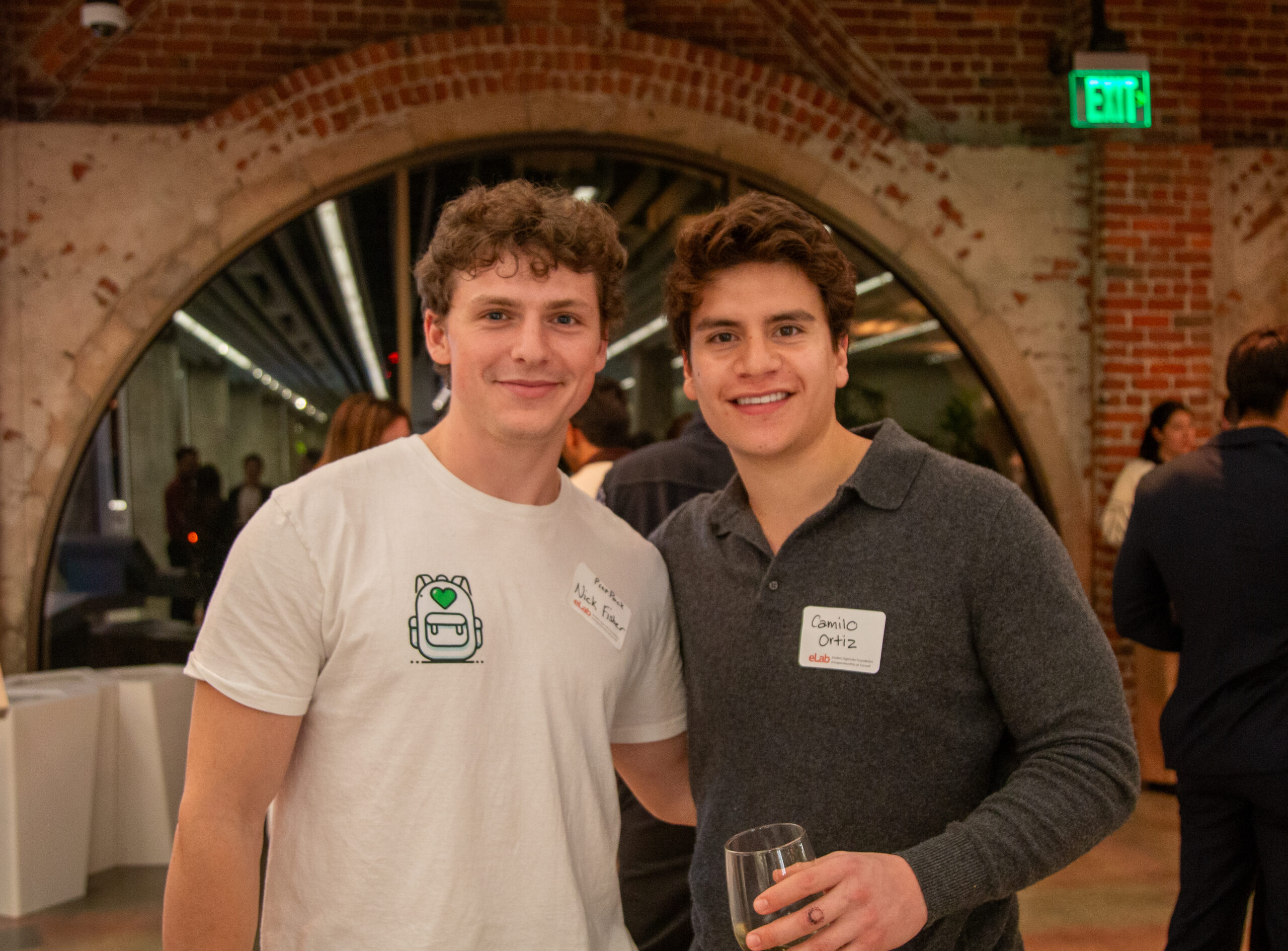 PrepPack founder, Nick Fisher '25 and Camilo Ortiz '25 founder of JOUS pose for a photo at the 2025 eLab Student Startup Showcase at San Francisco's Autodesk.